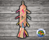 Planet Pleasures Pinata Spiked Bird Toy, a colorful hanging palm leaf pinata toy with bright streamers and fibers for chewing and shredding enrichment.