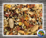 Goldenfeast Paradise Treat Mix for parrots, macaws, cockatoos, and large birds, featuring a natural treat blend with papaya, coconut, apricots, nuts, seeds, vegetables, fruits, legumes, and grains. Close Up