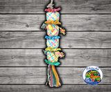 Planet Pleasures Flower Tower Bird Toy made from woven palm leaf with four stuffed pinatas, stars, small square pinatas, and stuffed boxes for chewing and shredding enrichment.