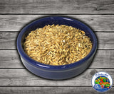 Whole oat groats grain used for feeding parrots finches and small birds.
