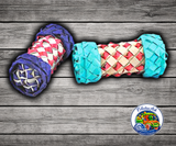 Planet Pleasures Dumbell Foot Toy made from colorful tightly woven palm leaf for parrots to hold, chew, shred, toss, or hang in the cage.